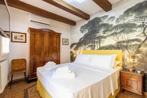 1 slaapkamer, een strijkplank/strijkijzer, wifi, beddengoed