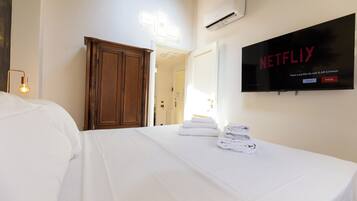 1 habitación, tabla de planchar con plancha, wifi y ropa de cama