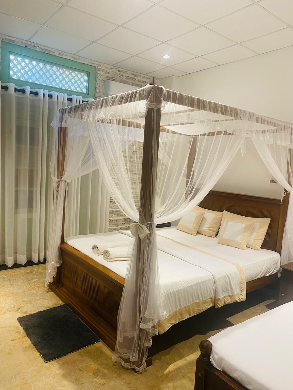 Deluxe Triple Room with Balcony Garden View with Free Airport transfer | Desk, free wired internet, bed sheets