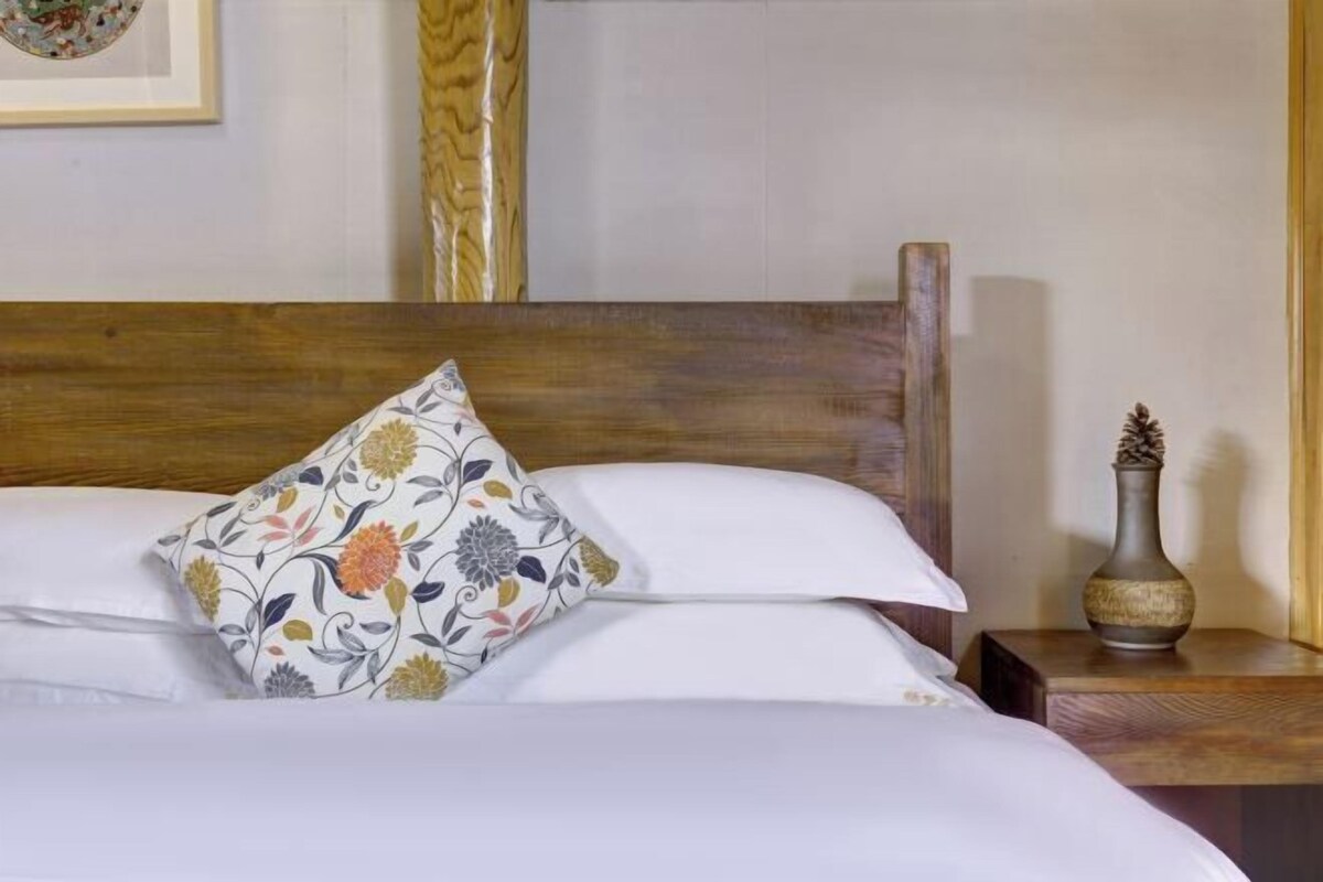 Down comforters, minibar, blackout drapes, iron/ironing board