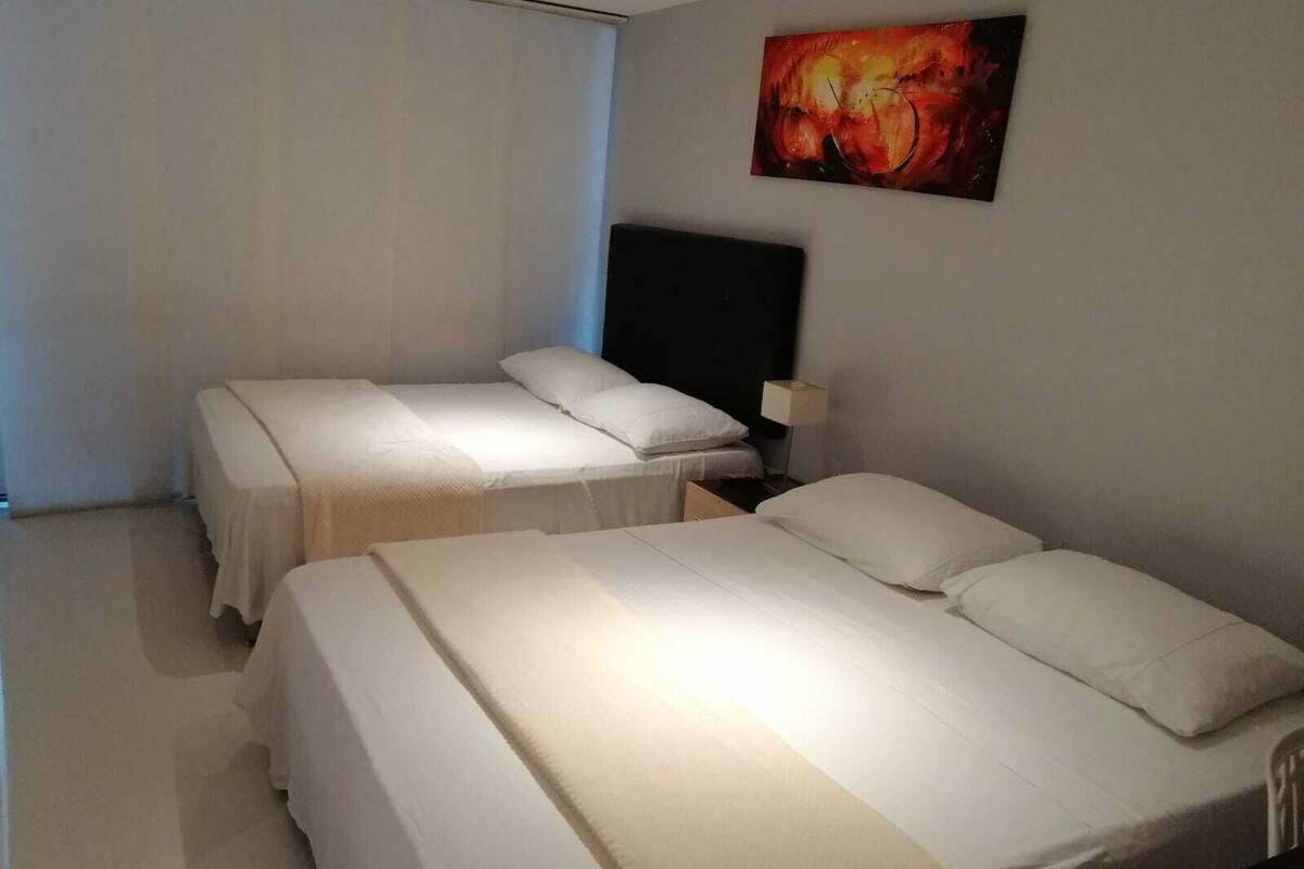 Deluxe Quadruple Room | In-room safe, free WiFi, bed sheets