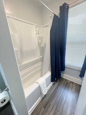 Bathtub, hair dryer, towels