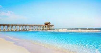 Resort with outdoor pool and lazy river only steps from the beach!