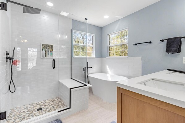 Shower, hair dryer, towels, soap