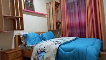 Premium bedding, memory foam beds, desk, laptop workspace