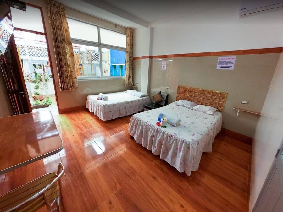 Room, 2 Queen Beds | Individually decorated, individually furnished, desk, laptop workspace