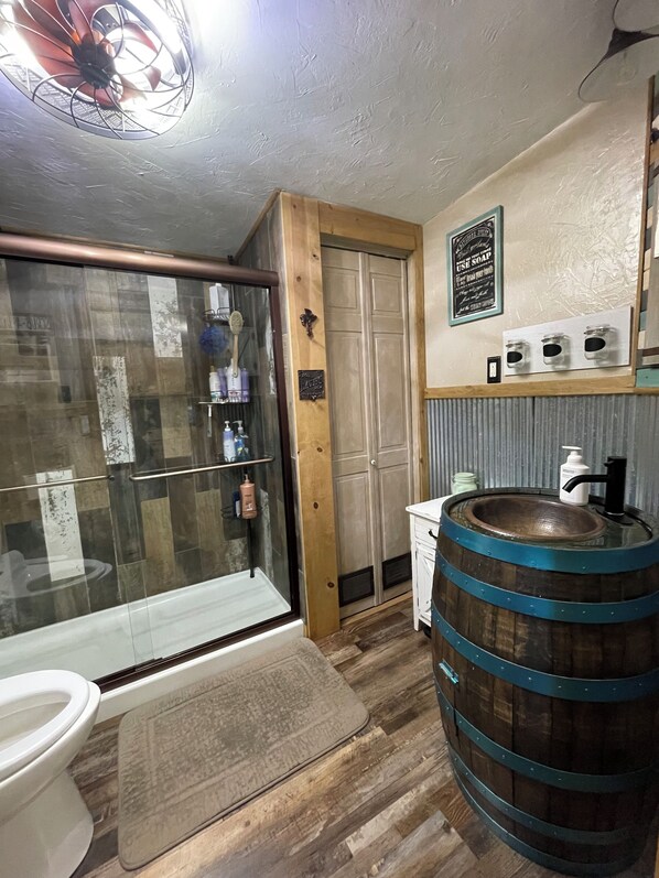 Shower, hair dryer, towels, soap