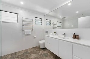 Shower, hair dryer, towels, soap