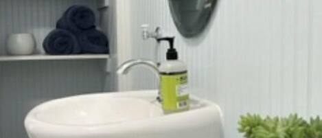 Hair dryer, towels, soap, shampoo