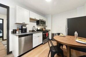 Fridge, microwave, oven, stovetop - ★ HostWise Stays ★ Pet Friendly, Butler St. Apt with Private Entrance (Pittsburgh)