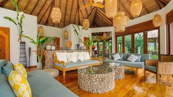 Basic Villa, Multiple Beds, Sea View | Living area | 55-inch Smart TV with digital channels, streaming services