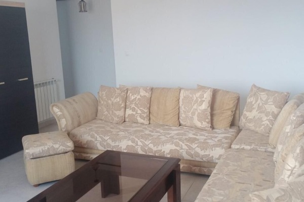 Comfort Apartment | Living area | 50-inch LED TV with satellite channels