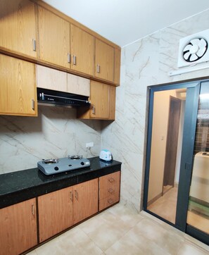 Comfort Apartment | Private kitchen | Fridge, microwave, stovetop, toaster