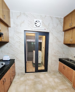 Comfort Apartment | Private kitchen | Fridge, microwave, stovetop, toaster