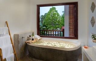 Suite Room Pool View | Minibar, desk, laptop workspace, blackout drapes