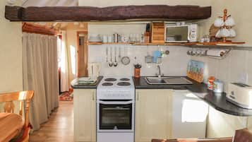 Fridge, electric kettle, toaster, cookware/dishes/utensils