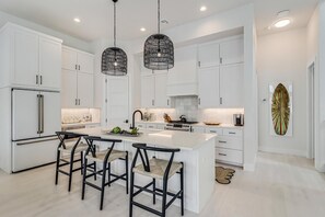 Full-size fridge, microwave, stovetop, dishwasher - Designer Beach Home at Cinnamon Shore South w/ Access to Great Amenities! (Port Aransas)