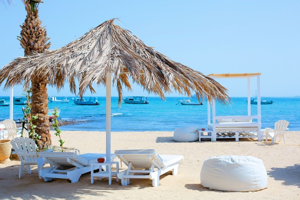 Private beach, beach umbrellas, beach towels, beach bar