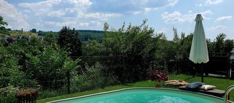 Tasteful and high-quality vacation apartment with large terrace and pool