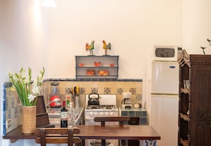 Apartamento clássico | Cozinha privada | Frigobar, micro-ondas, liquidificador, mixer de alimentos