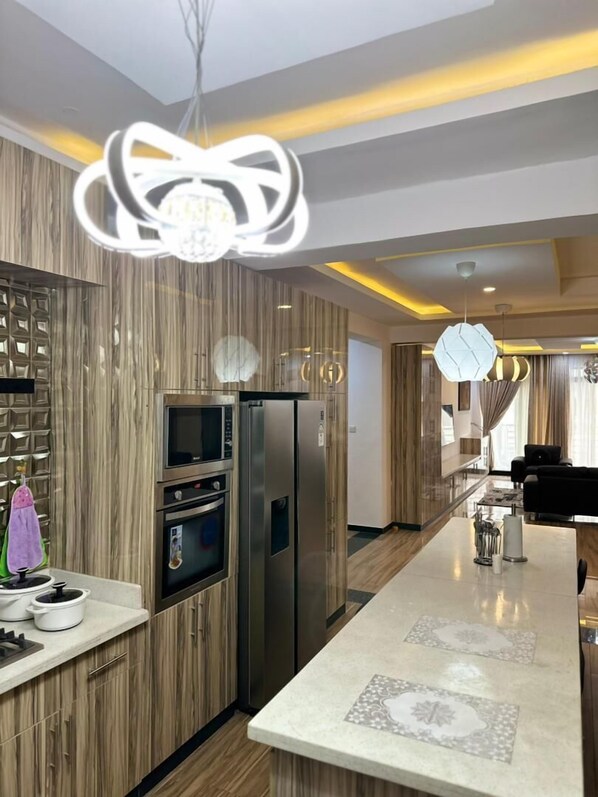 Luxury Apartment, Non Smoking, Ensuite | Private kitchen | Full-sized fridge, microwave, oven, stovetop