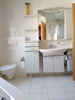 Hair dryer, bidet, towels, soap