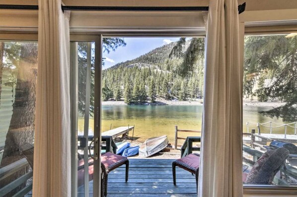 Enjoy a serene lake view from the comfort of your room, with a deck and access to the outdoors.