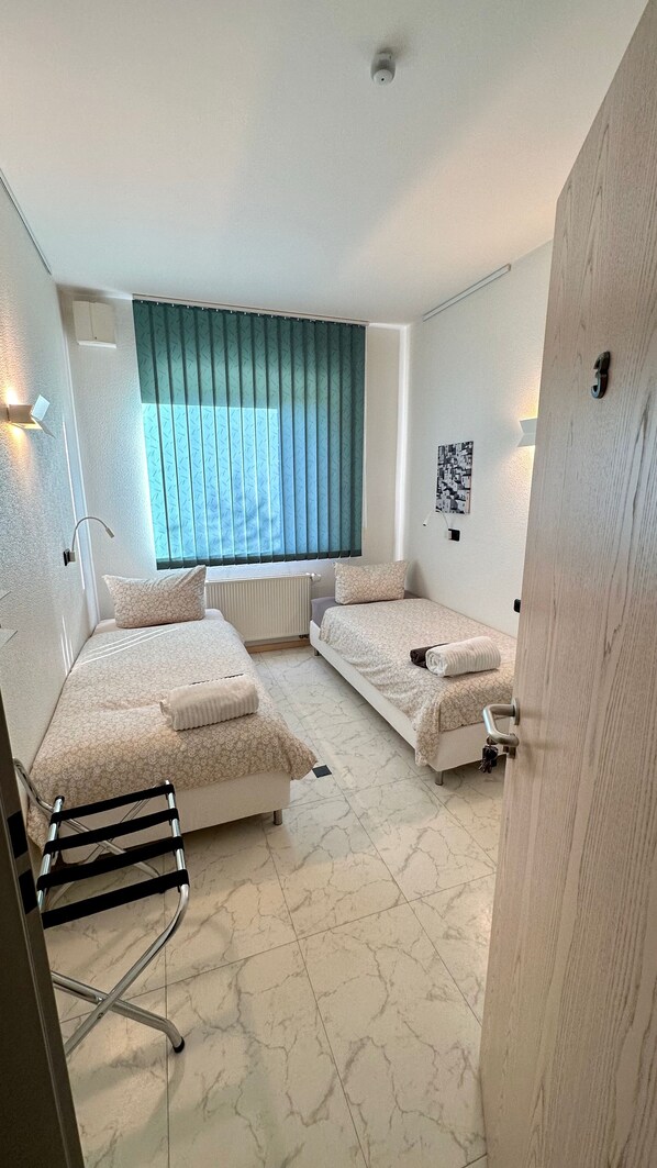 Economy Twin Room, Non Smoking, Garden View | Individually decorated, individually furnished, free WiFi, bed sheets