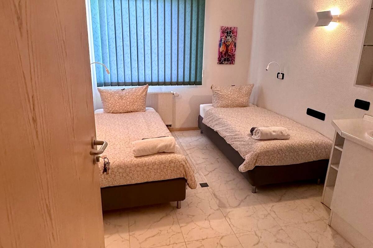 经济双床房, 无烟房, 花园景观 | 免费 WiFi、特色装修、特色家居、床单