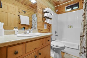 Hair dryer, towels, soap, shampoo