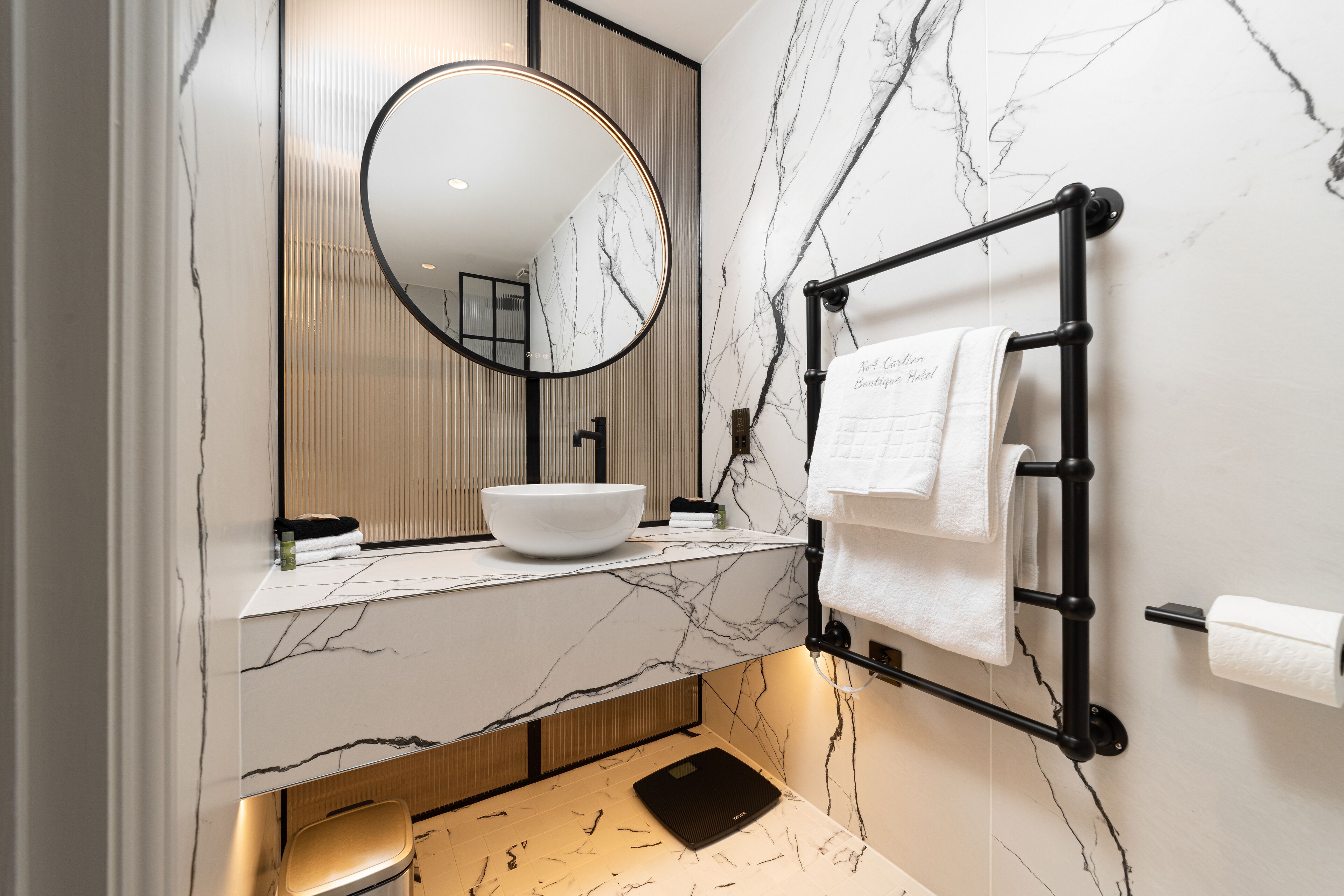 deluxe double room | bathroom | rainfall showerhead, free toiletries, hair dryer, bathrobes