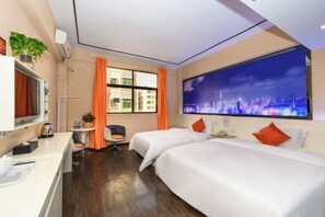 A hotel room with two beds, a desk, a chair, a TV, and a window with curtains. - Quanzi Art Inn (Shenzhen)