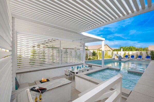 Outdoor pool, a heated pool - Luxe Retreat-5BR + Casita, Pool w/ Slide, Spa, Fire Pit, Ping Pong & Family Fun (Indio)