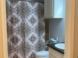 Hair dryer, towels, soap, shampoo