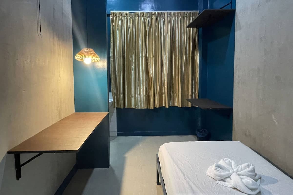 Desk, laptop workspace, free WiFi, bed sheets
