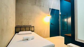 Desk, laptop workspace, free WiFi, bed sheets