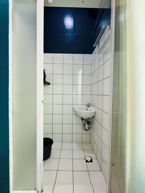 Economy Double Room, 1 Double Bed, Private Shower without Toilet | Bathroom | Towels, soap, shampoo, toilet paper - The Daylight Inn Davao (Davao)