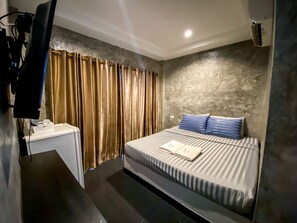 Quarto básico | 1 quarto, Wi-Fi de cortesia, roupa de cama