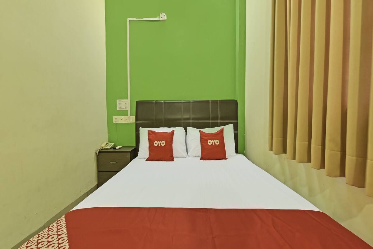 Habitación triple Deluxe | Ropa de cama