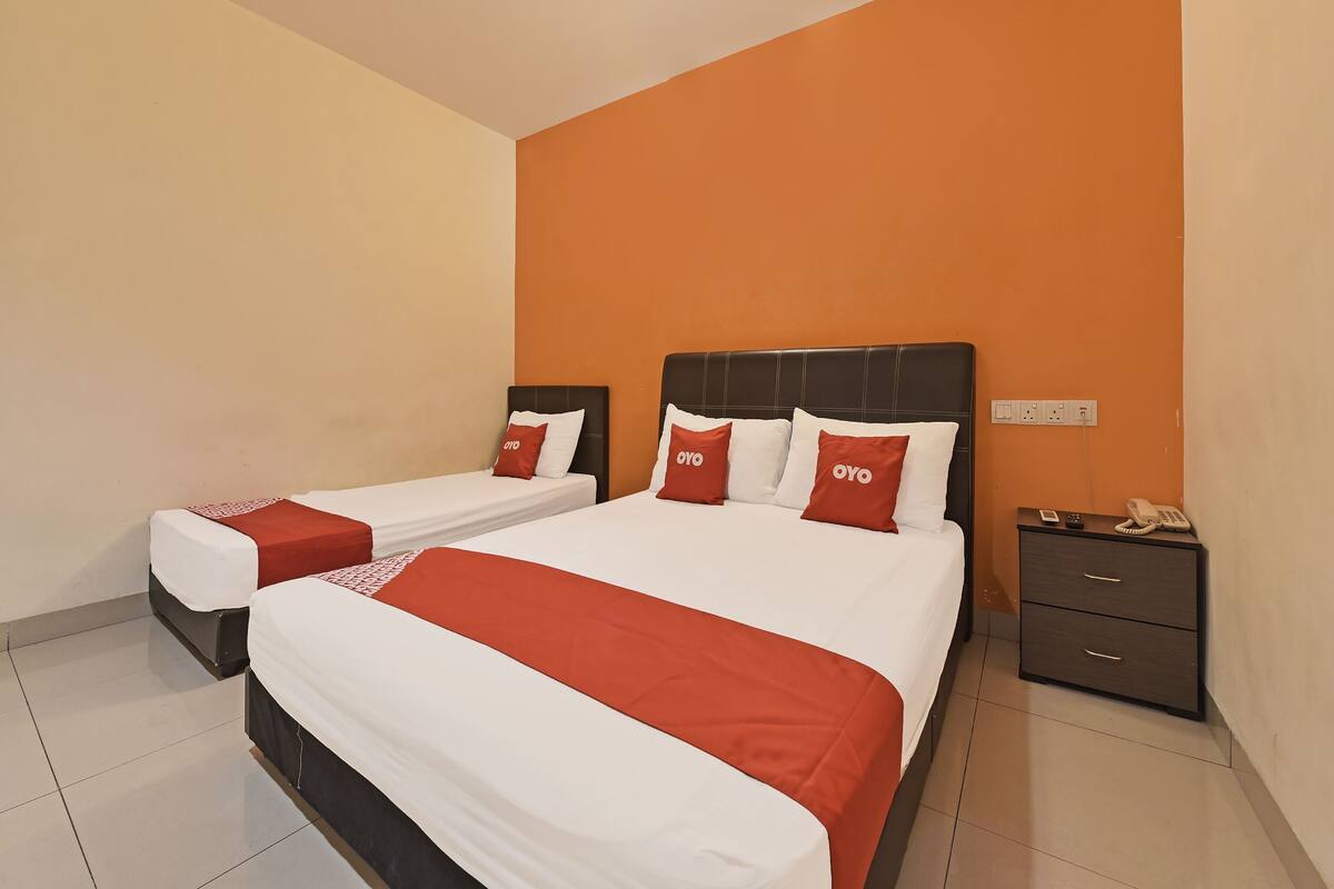 Habitación triple estándar | Ropa de cama