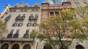 A historic building with classical architecture, featuring arched windows and a balcony. - Mandela Rhodes W303 (Cape Town)