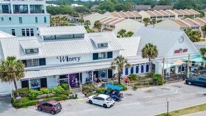 A building with a sign reading "Winery" and a storefront labeled "Boutique Clothing."