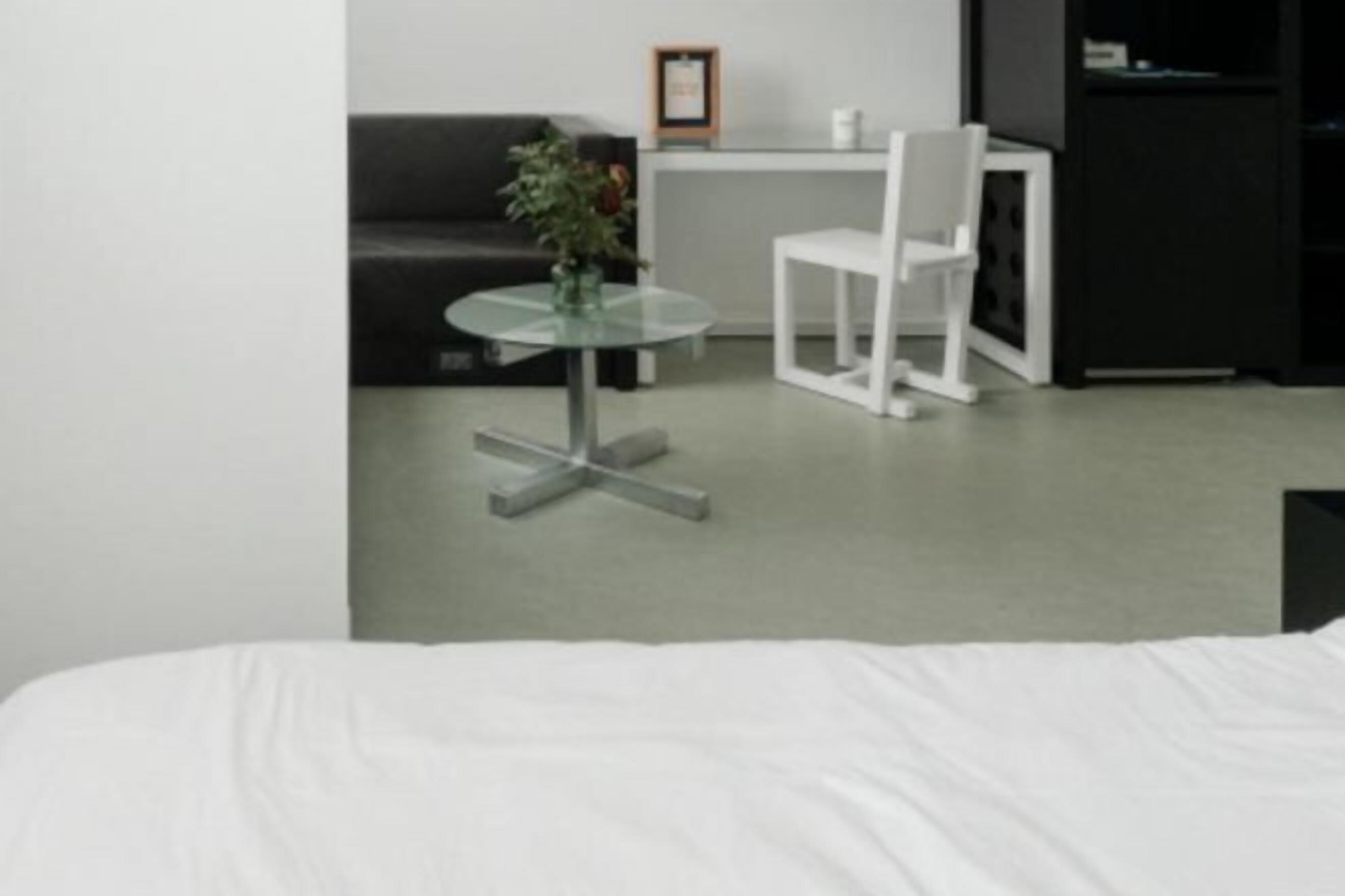 Premium bedding, memory foam beds, blackout drapes, free WiFi