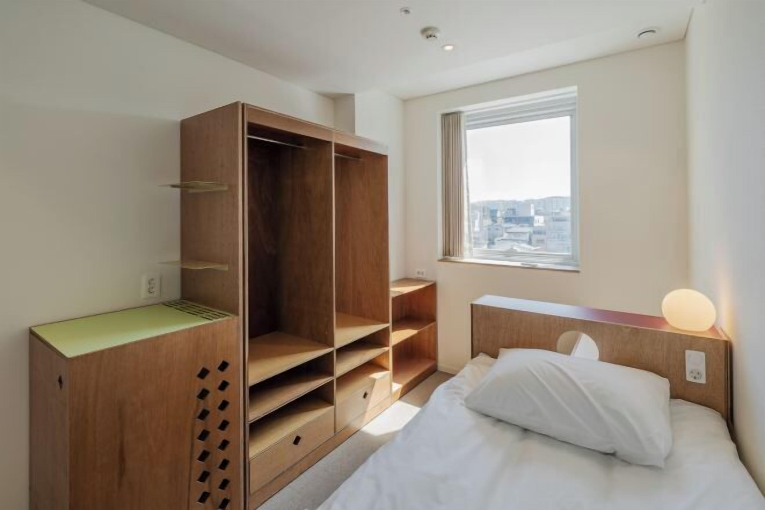 Premium bedding, memory foam beds, blackout drapes, free WiFi