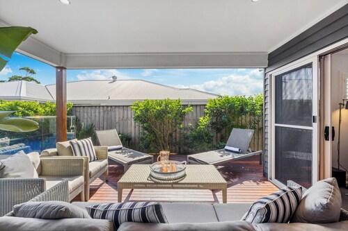 Oasis at Sapphire – Stylish Coastal Comfort with Poolside Living