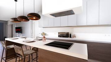 Chambre Quadruple Design | Cuisine privée