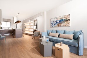 Design Quadruple Room | Living area | TV - Blue Avra by A&D Properties (Markopoulo Mesogaias)