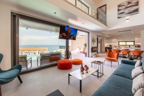 Exclusive Villa, 4 Bedrooms, Private Pool, Sea View | Living area | 32-inch Smart TV with satellite channels, TV - Seafront Villas (Chania)