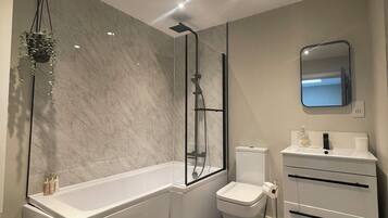 Hair dryer, towels, soap, shampoo