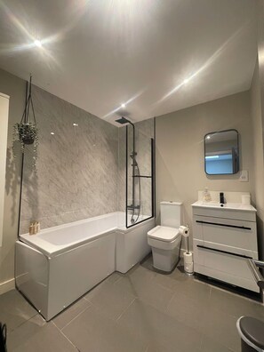 Hair dryer, towels, soap, shampoo